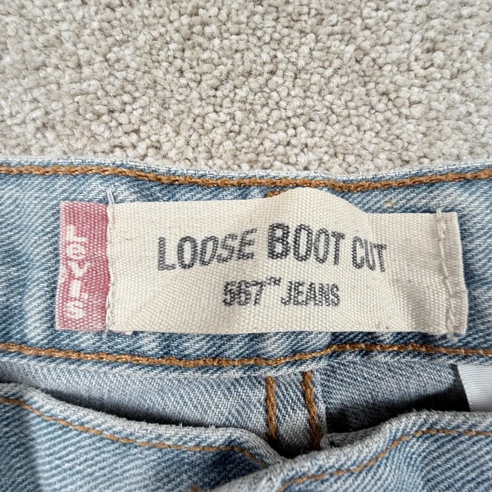Levi's 567 Loose Boot Cut Jeans Mens 36x31 (tag 36x34) Light Wash Denim Blue Y2K
